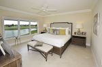 Master Bedroom With Sweeping Golf Course & Lake Views